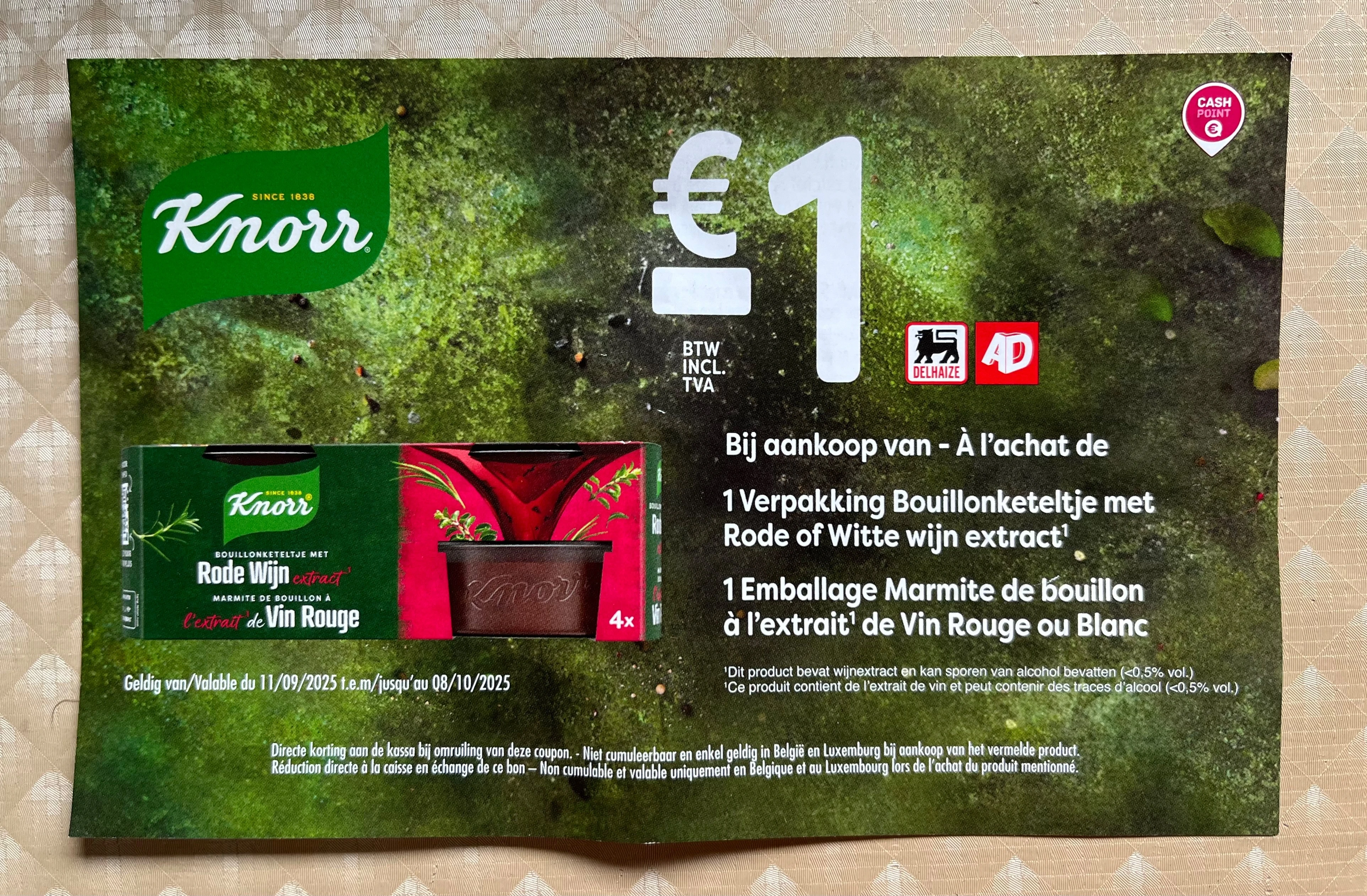 Coupon bouillonketeltje aan rek bij Delhaize