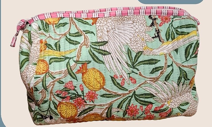 Gevlochten toilettas met vogel- en bloemenmotief