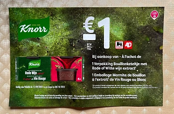 Coupon bouillonketeltje aan rek bij Delhaize