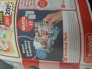 Bij aankoop van 5€ aan foto's aan de kiosk in...