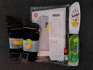 Kruidvat Antwerpen kleding met gele sticker -...
